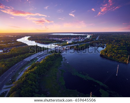 Aerial view of St. Johns River in Florida with a beautiful sunset. Royalty-Free Stock Photo #659645506