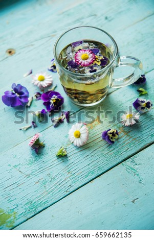 flower tea, herbal tea. pansies - edible flowers.