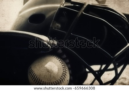 Vintage style baseball equipment. Shows old ball and mitt with batters helmet.  Great sports background or graphic