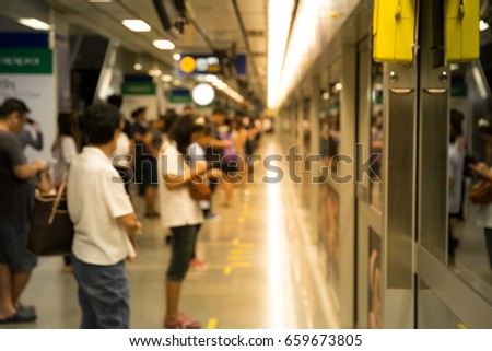 Motion blur - People waiting underground railways rush hour.
