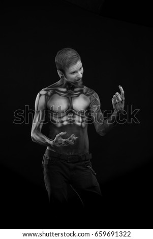 Black and white portrait, Character for computer game
Bodyart cyborg, male with pattern on body on black background