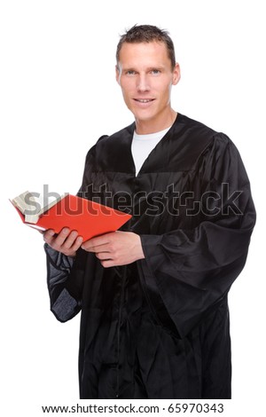 Full isolated studio picture from a young judge (lawyer) with statute book
