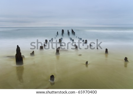 Baltic sea coast photographed with long exposure in pastel colors.