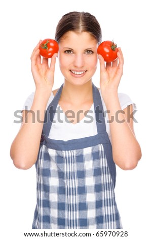 Full isolated studio picture from a young housewife in the kitchen