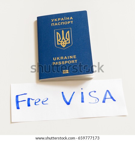 Ukrainian biometric passport with the inscription FREE VISA on a white background