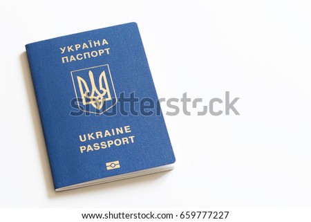 Ukrainian international biometric passport on neutral background.