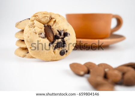 Almond Cookies and coffee break in white background