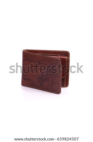 One purse, genuine leather with embossing ,black brown colors,Fashionable men's accessory To store money on a white background