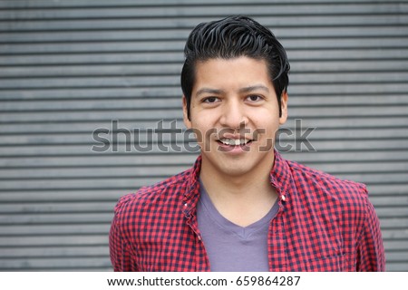 Joyful ethnic male smiling isolate with copy space