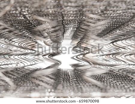Blury image of The mattress to sleep on the wire core. abstract picture background.