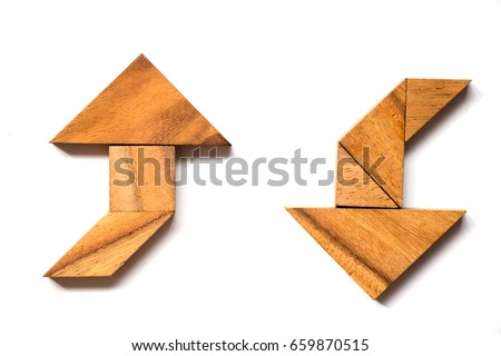 Wooden tangram puzzle in directional arrow shape on white background (Concept of making decision)