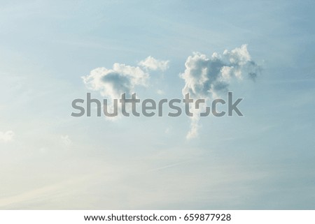 White fluffy clouds in the blue sky  
