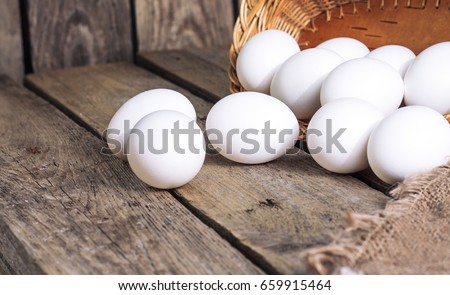 White eggs from the basket Royalty-Free Stock Photo #659915464
