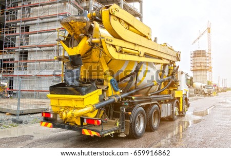 Concrete mixer truck on construction site. HDR Photo.