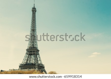 Eiffel tower on sunset sky background. Travel inspiration concept. Copy space. 