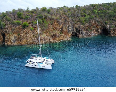 Spectacular place to park a catamaran along the cliffs and caves in the British Virgin Islands