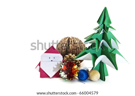 Origami Japanese christmas tree and Santa decorated with ornaments.