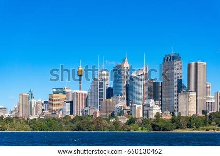 Sydney Central Business District cityscape with Royal Botanic Garden and Sydney Harbour on foreground