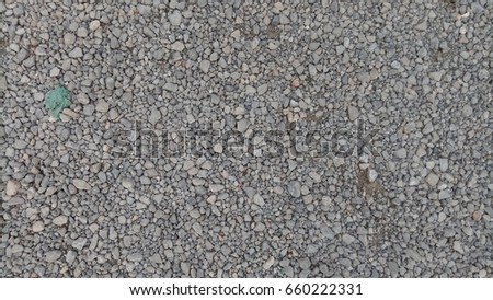 Ground with stones