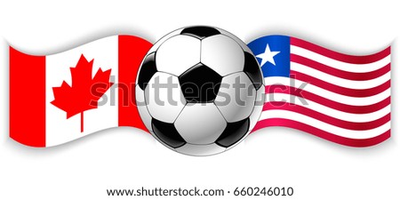 Canadian and Liberian wavy flags with football ball. Canada combined with Liberia isolated on white. Football match or international sport competition concept.