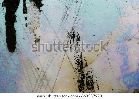 Interesting, clear glass, stained dark and light with paint and scratched. Blue, pink hue. Interesting background