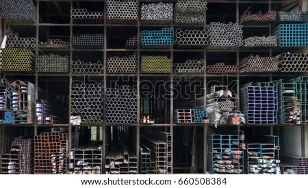 Steel Pipes bunch on the rack in warehouse