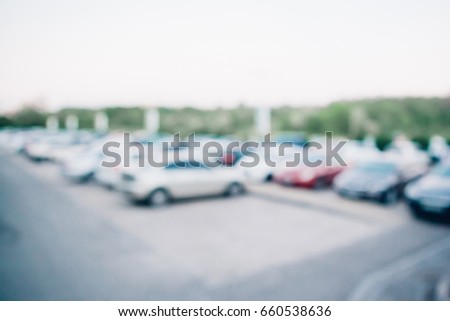 Blurred car parking background in afternoon