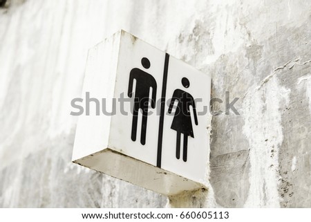 Symbol of public toilets in building structure, unisex service