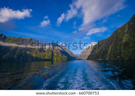 landscape of high mountain glacier at milford sound with a beautiful lake, in south island in New Zealand