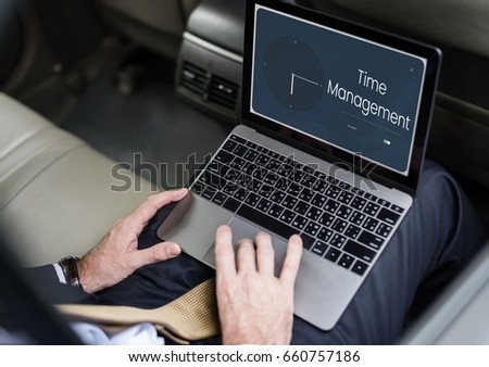 People using laptop with clock and time icon