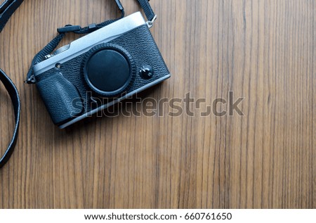 Camera on wooden floor