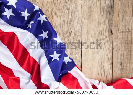 American flag on wood background for Memorial Day or 4th of July
