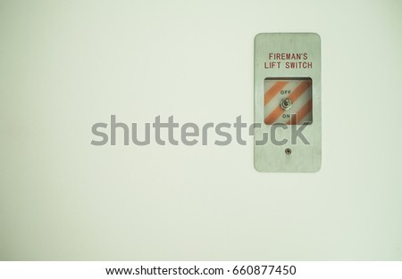 The fireman's lift switch on the white background, emergency and safety concept.