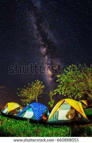 Long exposure photograph of milky way over camping tent in phu thap boek,Pechabun,Thailand