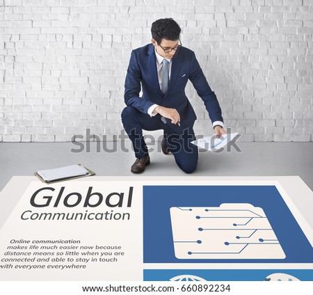 Man working on billboard network graphic overlay on floor