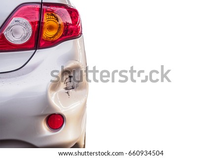 car has dented rear bumper damaged after accident isolated on white Royalty-Free Stock Photo #660934504