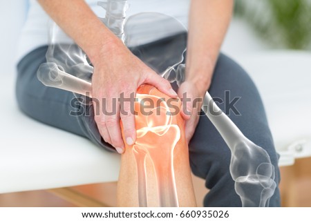 Digitally generated image of man suffering with knee pain  Royalty-Free Stock Photo #660935026