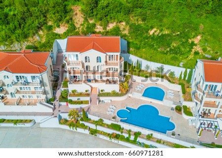 Top view of houses with a swimming pool