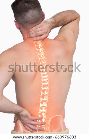 Digital composite of highlighted spine of man with back pain against white background