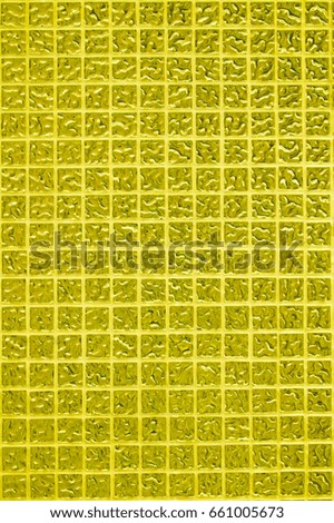 Gold tile wall of high resolution real photo or brick seamless and texture of interior background
