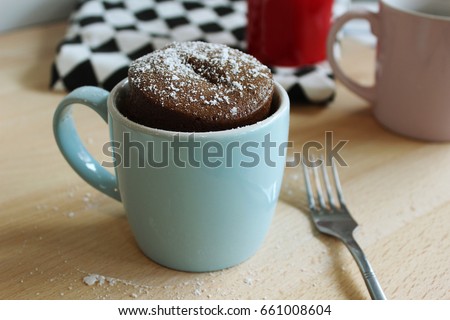 chocolate mug cake Royalty-Free Stock Photo #661008604