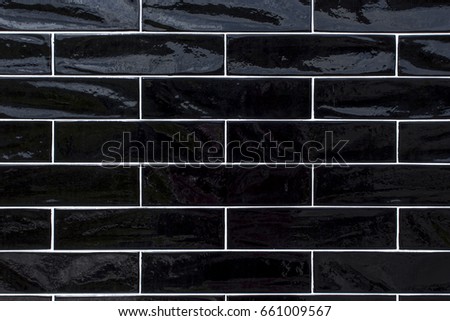 Black background created from picture of wall ceramic tiles.
