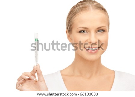 picture of attractive female doctor with thermometer