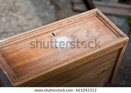 Wooden texture. Wooden shavings on a shelf, wooden box. Work with wood