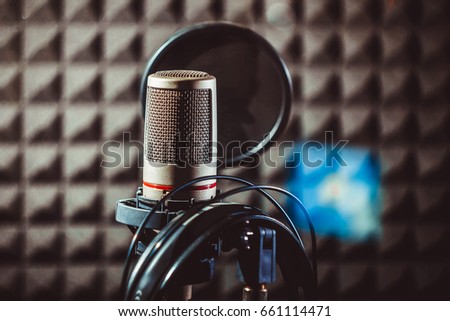 The microphone in the recording studio stands on the counter