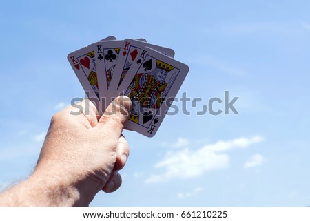 Poker cards on white backgrounds.Four kings in hand