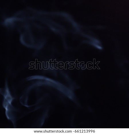 Abstract figure of bluish smoke on a dark background. A collection of square backgrounds and textures.