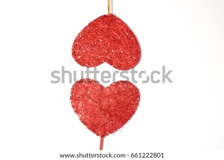 Fabric Wooden Heart Shapes on Sticks on White background
