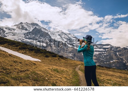 Hiking in the beautiful Alps. Scenic landscape. Outdoor activities in Switzerland. 2017