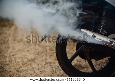 Smoke from a motorcycle exhaust